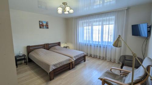 Berehove Apartment | Family-Friendly Two-Bedroom Apartment by the Pool