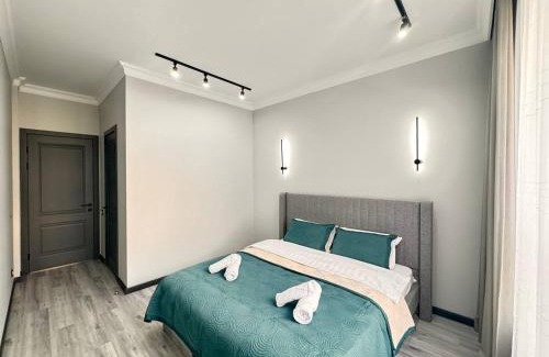 Almaty Apartment | Discover ЖК AMIR: Family-Friendly Stay Near Mega Flat