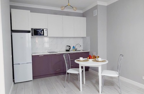 Yesil District Apartment | Family-Friendly ЖК Only Sun: 10 Minutes from the Airport