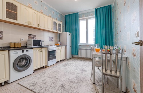 Yesil District Apartment | Cozy Stay at Кабанбай батыра 58б with Breakfast Included