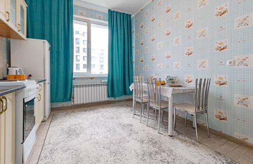 Yesil District Apartment | Cozy Stay at Кабанбай батыра 58б with Breakfast Included