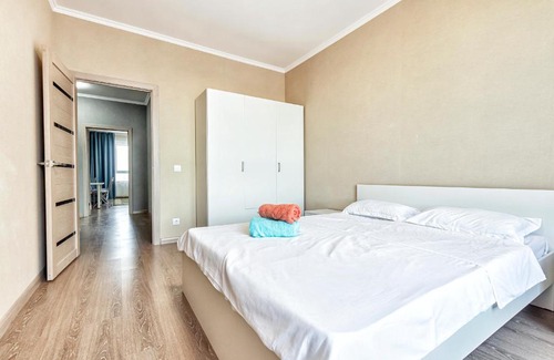Nur-Sultan Apartment | Prime City Apartment with Pool and Restaurant - 9.2/10 Score