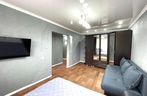 Petropavlovsk Apartment | Cozy Apartment in the Heart with Family-Friendly Amenities