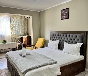 Shymkent Apartment | Kid-Friendly Mini-Hotel AI with Great Guest Ratings