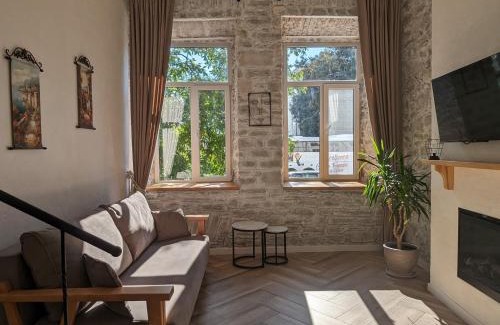 Kamenets-Podol'skiy Apartment | Experience Квітка на камені in the Heart of Старе місто