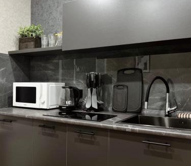 Karagandy Apartment | Discover Нуркен Абдирова 36: Family-Friendly Retreat