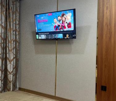 Karagandy Apartment | Discover Нуркен Абдирова 36: Family-Friendly Retreat