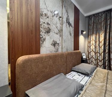 Karagandy Apartment | Discover Нуркен Абдирова 36: Family-Friendly Retreat