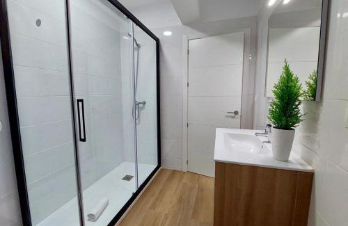 El Molinillo Apartment | Elegant San Bartolomé Apartment with Ocean Views & More