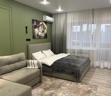 Kostanay Apartment | Modern City Center Apartment - Family Friendly & 10/10 Rated