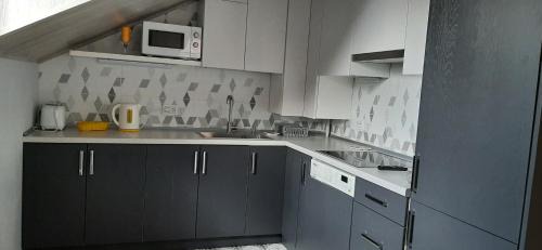 Kamenets-Podol'skiy Apartment | Bright Sunlit Loft: Ideal for Families - Rated 9.9/10