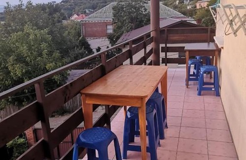 Dzhubga House | Tranquil Courtyard: Pet-Friendly Stay with Hot Tub