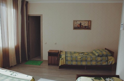 Dzhubga House | Tranquil Courtyard: Pet-Friendly Stay with Hot Tub