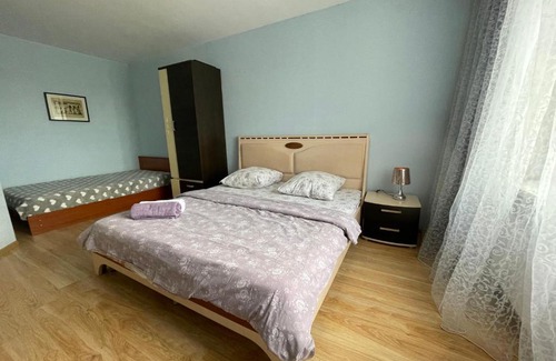 Pskov Apartment | Elegant Stay at Труда 50 with Breakfast & Accessibility