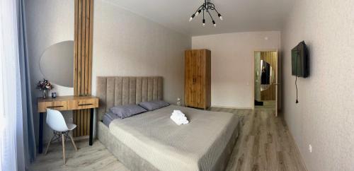 Kostanay Apartment | Discover Comfort at 1-ком Костанай Плаза with Hot Tub