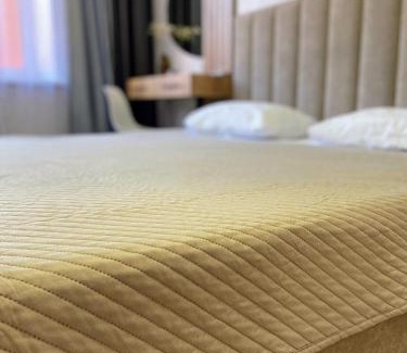 Kostanay Apartment | Discover Comfort at 1-ком Костанай Плаза with Hot Tub