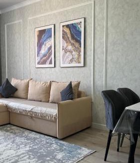 Nur-Sultan Apartment | Cozy Apartment Near Bayterek with Family-Friendly Amenities