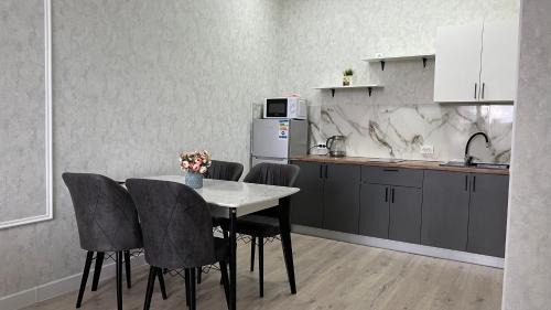 Nur-Sultan Apartment | Cozy Apartment Near Bayterek with Family-Friendly Amenities