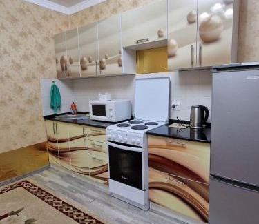 Nur-Sultan Apartment | Cozy Comfort Class Apartment - Rated 10/10 and Family-Friendly