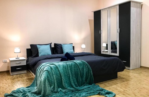 Mukachevo Apartment | Elegant Villa del Re: Child-Friendly Dual-Level Apartment