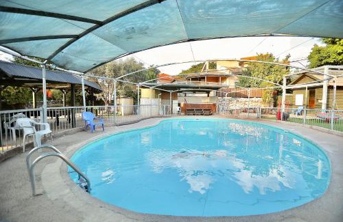 Vered Hagalil Cabin | Nature's Oasis Resort: Family Cabins with Pool & Hot Tub