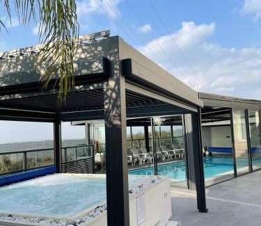 Ein Ya'akov Villa | Discover אחוזת שקד בוטיק: 4-Star Retreat with Pool & Views