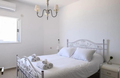 Netanya Apartment | Elegant Duplex Escape: Family-Friendly Comfort Awaits