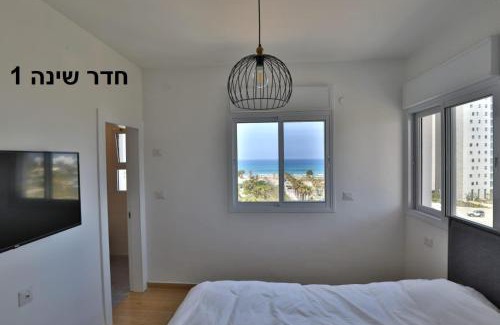 Hadera Apartment | Beachfront Gem in Turquoise with High Guest Ratings