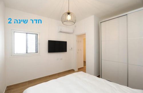 Hadera Apartment | Beachfront Gem in Turquoise with High Guest Ratings