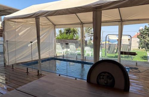Tiberias Cabin | Relaxing Getaway at מבית תכלת: Pet-Friendly Retreat