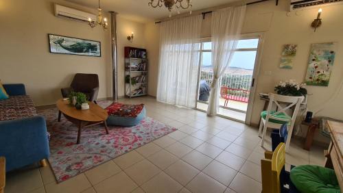Yodfat Villa | Seaside Retreat: Oceanfront Apartment with Panoramic Views