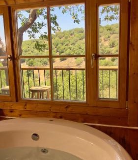 Mattat Cabin | Discover Pisgat Mattat: Oceanfront Retreat with Hot Tub