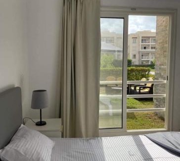Sidi Abd El-Rahman Apartment | Discover أمواج الساحل الشمالي: Family-Friendly Retreat