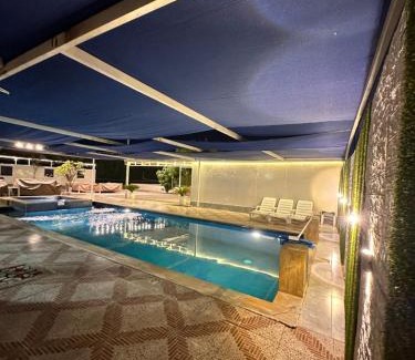Falaj al Moalla House | Experience استراحة الخيالة: Oceanfront Bliss Awaits You