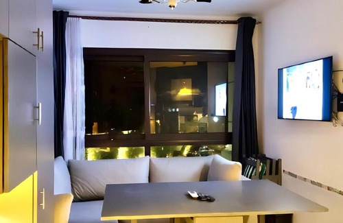 Al-Manasrah Apartment | Relax in Porto Said Studio with Pool and Oceanfront Views