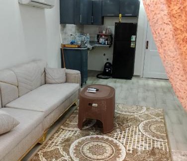 Ad-Dab'ah Apartment | Discover العلمين: Family-Friendly Escape with Pool Access