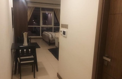 Muharraq Apartment | Discover برج بلس: A Relaxing Stay with Pool Access