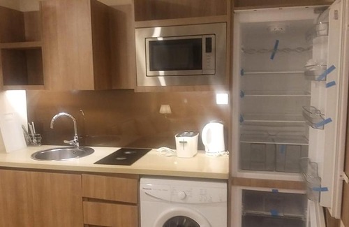 Muharraq Apartment | Discover برج بلس: A Relaxing Stay with Pool Access