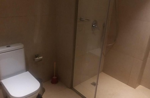 Muharraq Apartment | Discover برج بلس: A Relaxing Stay with Pool Access