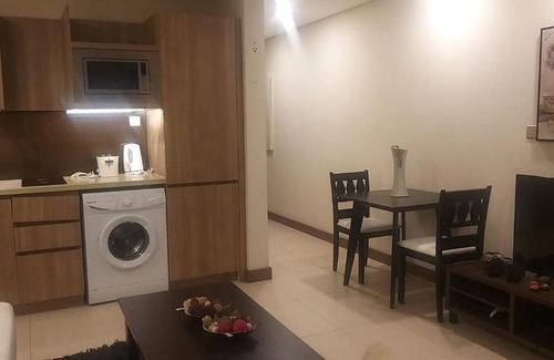 Muharraq Apartment | Discover برج بلس: A Relaxing Stay with Pool Access
