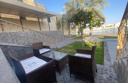Dhahran Ski Chalet | Discover COV FIlLA: Oceanfront Oasis with Pool Access