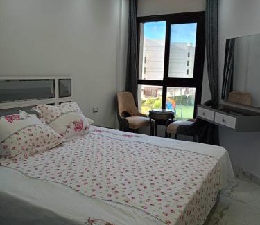Al-Manasrah Apartment | Oceanfront Retreat at Porto Said Resort: Pet Friendly Stay