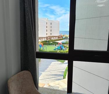 Al-Manasrah Apartment | Oceanfront Retreat at Porto Said Resort: Pet Friendly Stay