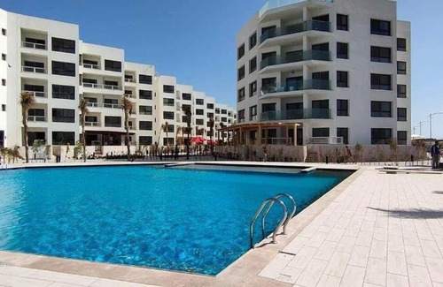 Al-Manasrah Apartment | Discover Relaxation at شاليه ببورتو سعيد with Pool Access