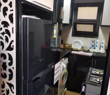 Al-Manasrah Apartment | Discover Porto Said Hotel with Pool & Family-Friendly Vibe