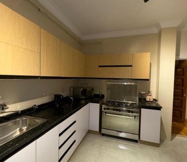 Al Duqqi Apartment | Discover Murooj Real Estate: Family-Friendly & Relaxing Getaway