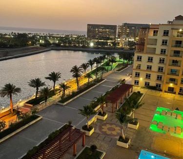 Bay La Sun Apartment | Baylasun View: Oceanfront Retreat with Pool & Family-Friendly