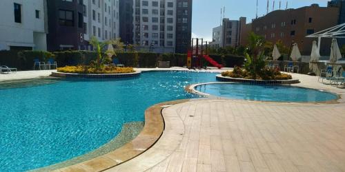 New Cairo Apartment | Family-Friendly Duplex in New Porto Cairo with Ocean Views