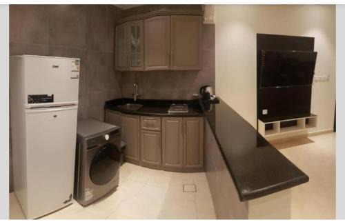 Taif Apartment | Experience الرمال الذهبية: Child-Friendly Retreat Awaits