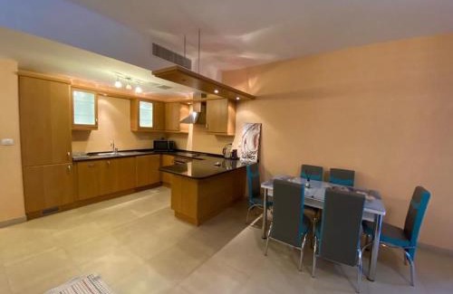 Aqaba Apartment | Relax in a Poolside Apartment with Family-Friendly Perks